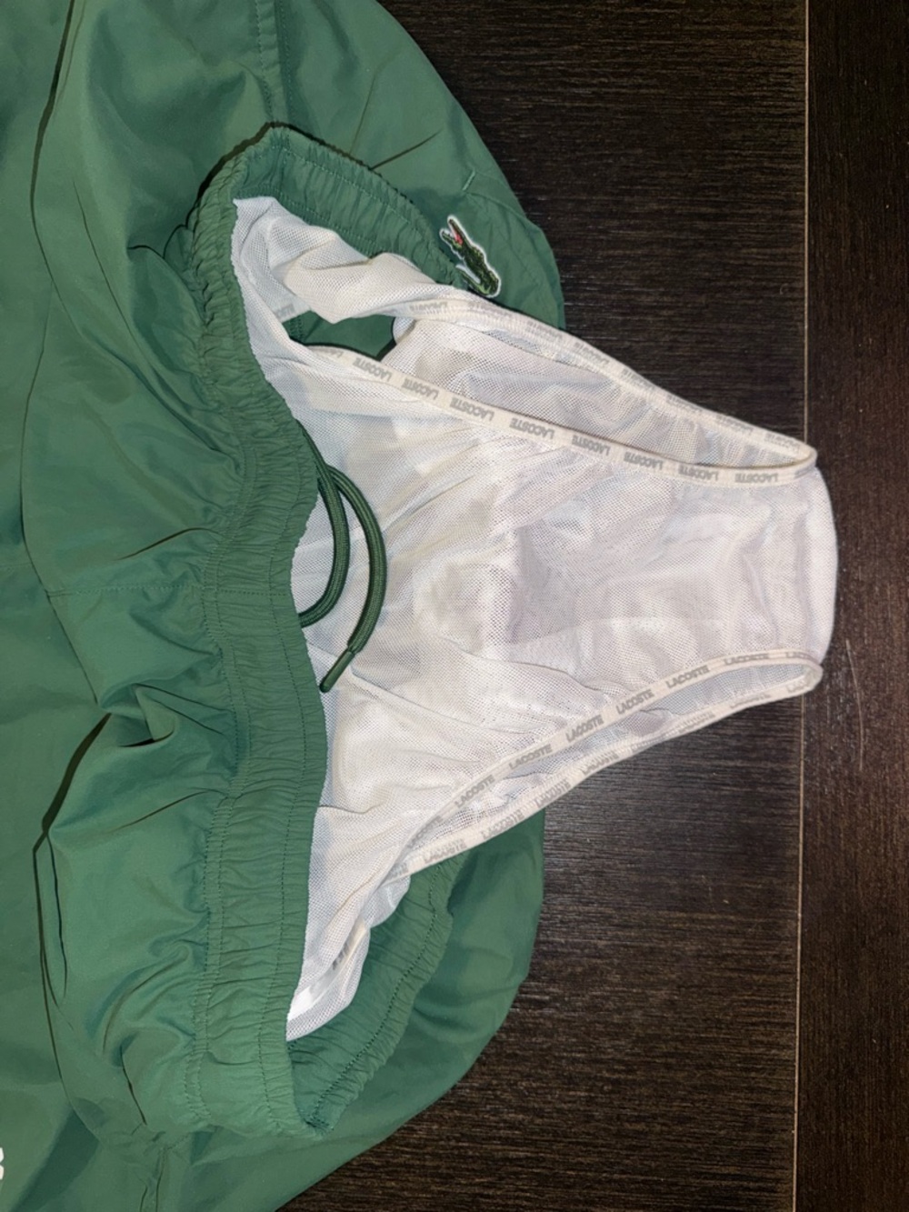 Lacoste Dark Green Athletic Swim Shorts with White Logo Text - Picture 8 of 8